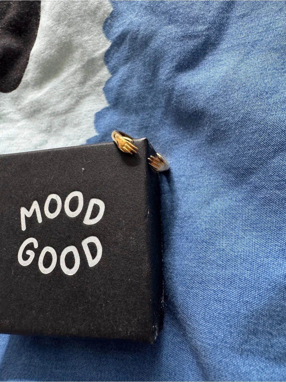 Mood Good / Good Daze hand hugging ring